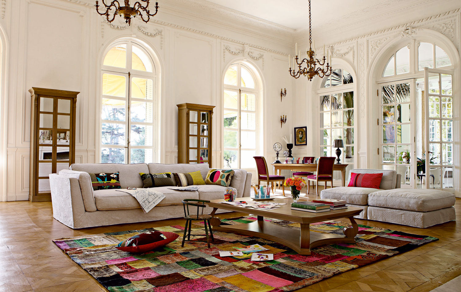 Adding a pop of royal flair: the purple overdyed rug anchors the space with vibrant charm under the table