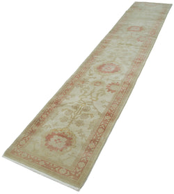 Collection of 2' 6'' x 13' 3'' Beige Oriental Oushak Rug - 34396 in a gallery layout