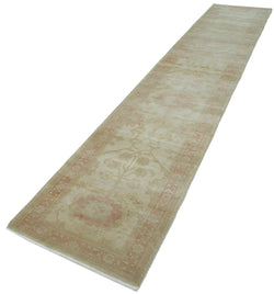 Collection of 2' 6'' x 13' 3'' Hand-Knotted Oushak Rug in a gallery layout