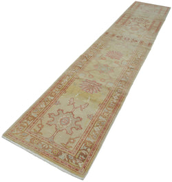 Collection of 2' 4'' x 13' 7'' Hand-Knotted Runner Rug in a gallery layout