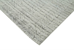 Collection of 9' 10'' x 13' 9'' Grey Moroccan Rug in a gallery layout