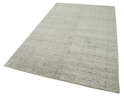 Collection of 5' 1'' x 8' 1'' Beige Color Moroccan Rug in a gallery layout