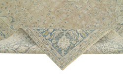 Collection of 6' 7'' x 10' 1'' Hand-Knotted Turkish Vintage Rug in a gallery layout