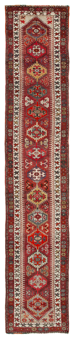 Collection of 2' 6'' x 13' 9'' Handmade Bohemian Runner Rug in a gallery layout