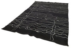 Collection of 6' 3'' x 10' 2'' Black Color Moroccan Rug in a gallery layout