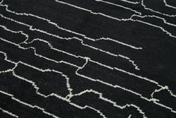 Collection of 6' 3'' x 10' 2'' Black Color Moroccan Rug in a gallery layout