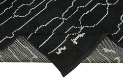 Collection of 6' 3'' x 10' 2'' Black Color Moroccan Rug in a gallery layout