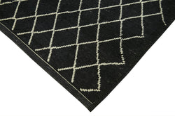 Collection of 5' 10'' x 7' 7'' Black Color Moroccan Rug in a gallery layout