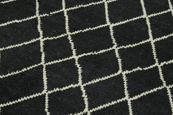 Collection of 5' 10'' x 7' 7'' Black Color Moroccan Rug in a gallery layout