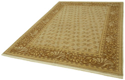 Collection of 6' 8'' x 9' 3'' Hand-Knotted Oushak Rug in a gallery layout