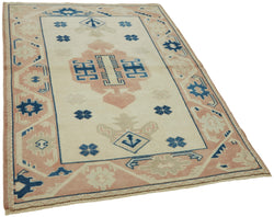 Collection of 4' 1'' x 5' 6'' Beige Small Vintage Rug in a gallery layout