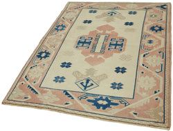 Collection of 4' 1'' x 5' 6'' Beige Small Vintage Rug in a gallery layout