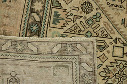 Collection of 9' 7'' x 12' 10'' Vintage Handmade Oriental Rug in a gallery layout