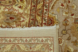 Collection of 9' x 12' 9'' Beige Vintage Oversized Rug in a gallery layout