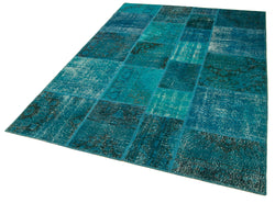 Collection of 5' 7'' x 7' 10'' Hand-Knotted Turkish Patchwork Rug in a gallery layout