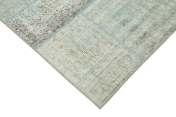 Collection of 5' 7'' x 7' 10'' Hand-Knotted Turkish Patchwork Rug in a gallery layout