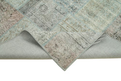 Collection of 5' 7'' x 7' 10'' Hand-Knotted Turkish Patchwork Rug in a gallery layout