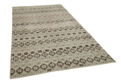 Collection of 5' 1'' x 9' 5'' Hand-Knotted Turkish Boho Rug in a gallery layout