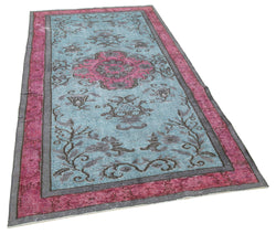 Collection of 4' 7'' x 8' 2'' Turkish Hand Carved Rug in a gallery layout