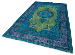 Collection of 6' 2'' x 10' 6'' Handmade Turkish Blue Rug in a gallery layout