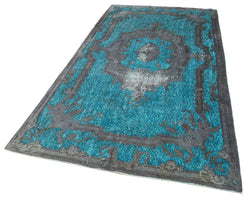 Collection of 5' 1'' x 9' 4'' Turkish Hand Carved Rug in a gallery layout