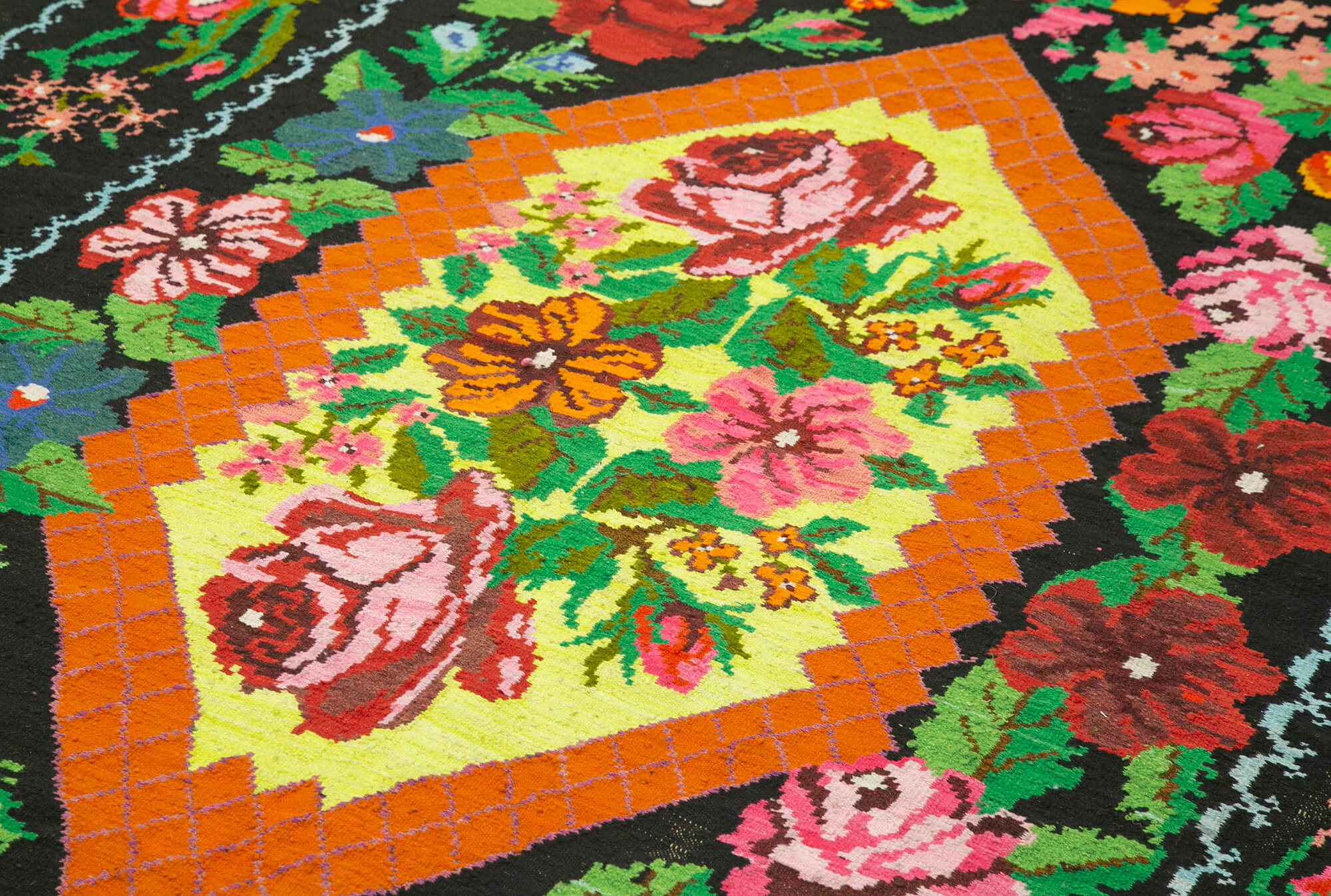 Collection of 6' 4'' x 10' 2'' Moldovan Rose Floral Kilim in a gallery layout