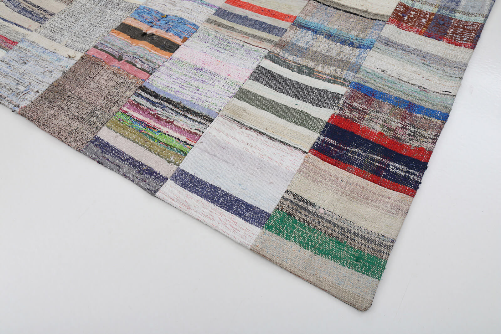 Collection of 6' 7'' x 9' 9'' Vintage Turkish Patchwork Kilim Rug in a gallery layout