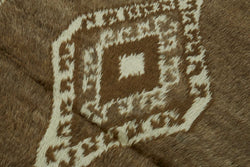 Collection of 3' 5'' x 5' 5'' Vintage Tulu Rug in a gallery layout