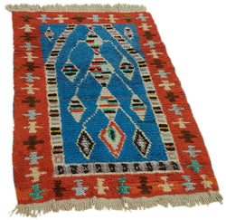 Collection of 2' 2'' x 3' 5'' Vintage Tulu Rug in a gallery layout