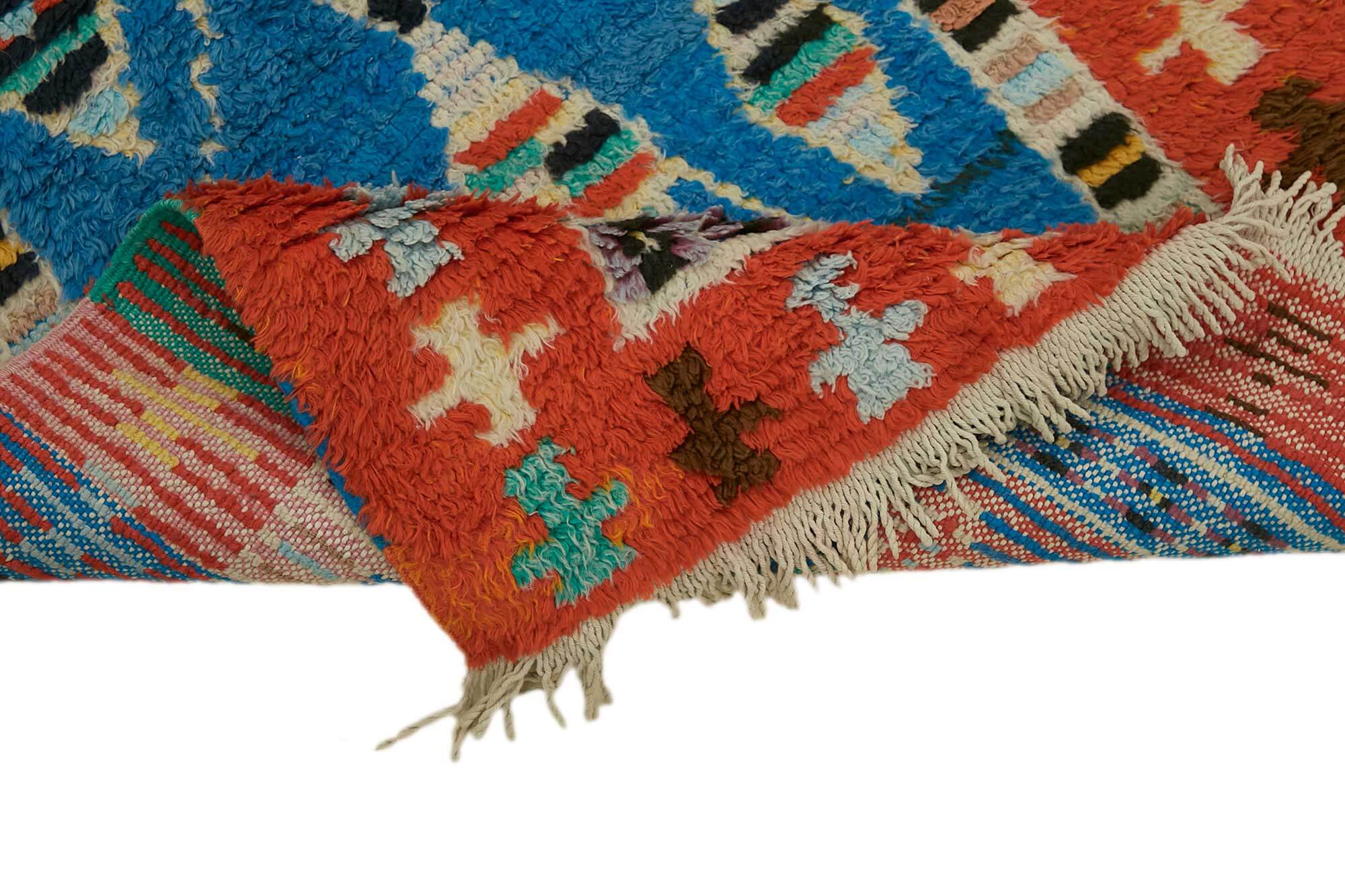 Collection of 2' 2'' x 3' 5'' Vintage Tulu Rug in a gallery layout