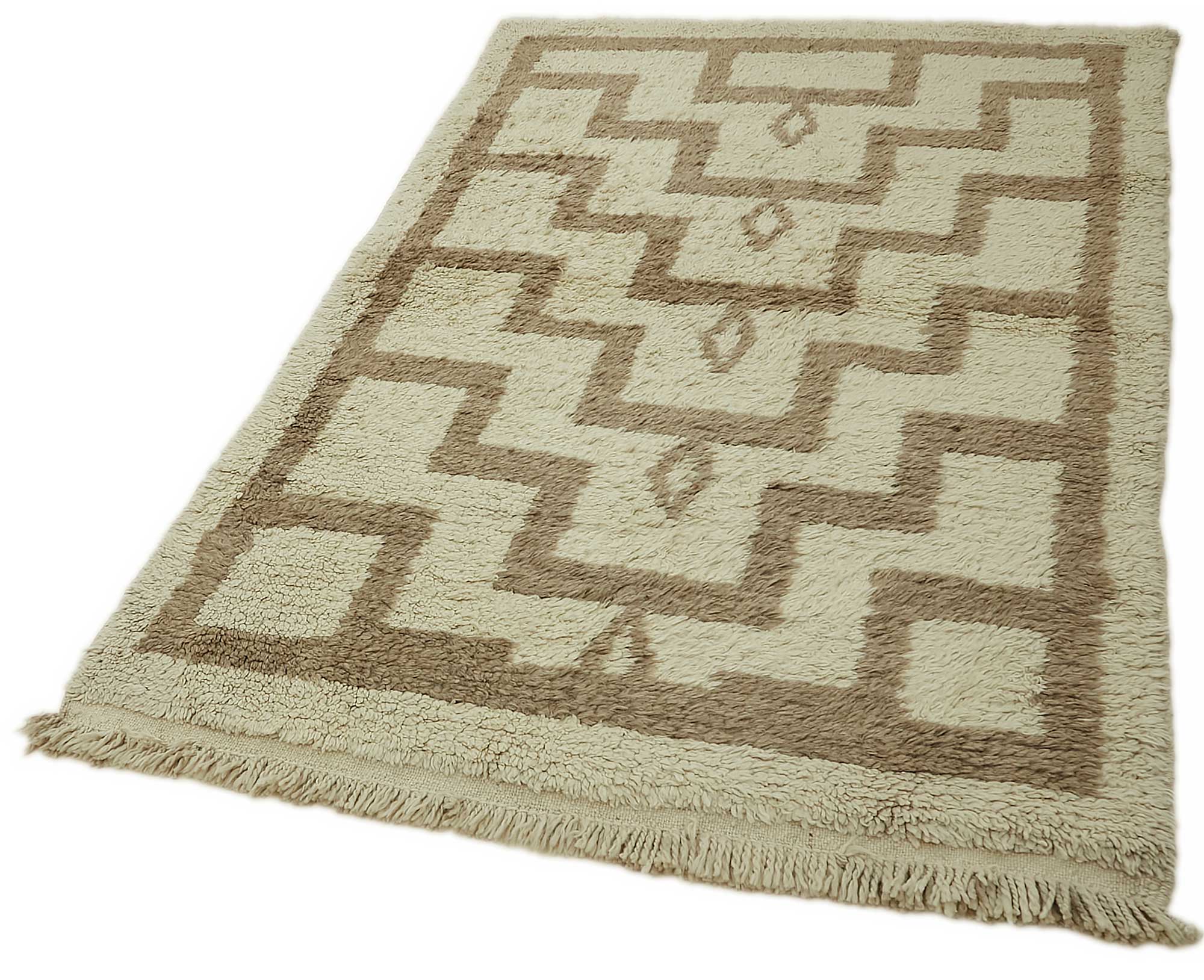 Collection of 3' 11'' x 6' 1'' Vintage Tulu Rug in a gallery layout