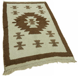 Collection of 3' 8'' x 5' 8'' Vintage Tulu Rug in a gallery layout