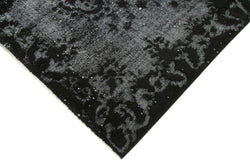 Collection of 5' 8'' x 8' 10'' Over-dyed Turkish Black Rug in a gallery layout