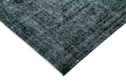 Collection of 9' 9'' x 12' Black Vintage Hand-Knotted Rug in a gallery layout