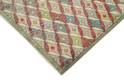 Collection of 5' 1'' x 9' 5'' Hand-Knotted Turkish Boho Rug in a gallery layout