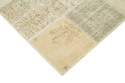 Collection of 4' 8'' x 6' 8'' Hand-Knotted Turkish Patchwork Rug in a gallery layout