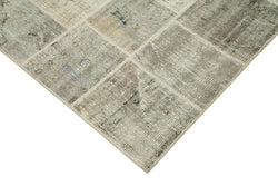 Collection of 5' 8'' x 8' 1'' Hand-Knotted Turkish Patchwork Rug in a gallery layout