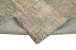 Collection of 5' 9'' x 8' 0'' Hand-Knotted Turkish Patchwork Rug in a gallery layout