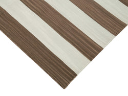 Collection of 3' 7'' x 5' 7'' Striped Dhurrie Rug in a gallery layout