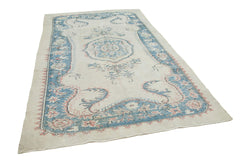 Collection of 6' x 9' 9'' Hand-Knotted Turkish Boho Rug in a gallery layout