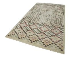 Collection of 5' 1'' x 9' 8'' Hand-Knotted Turkish Boho Rug in a gallery layout