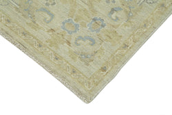 Collection of 9' x 11' 7'' Hand-Knotted Oushak Rug in a gallery layout