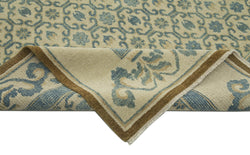 Collection of 9' 11'' x 13' 11'' Hand-Knotted Oushak Rug in a gallery layout