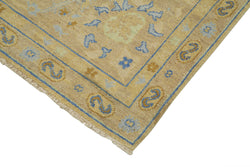 Collection of 8' 11'' x 12' 0'' Hand-Knotted Oushak Rug in a gallery layout