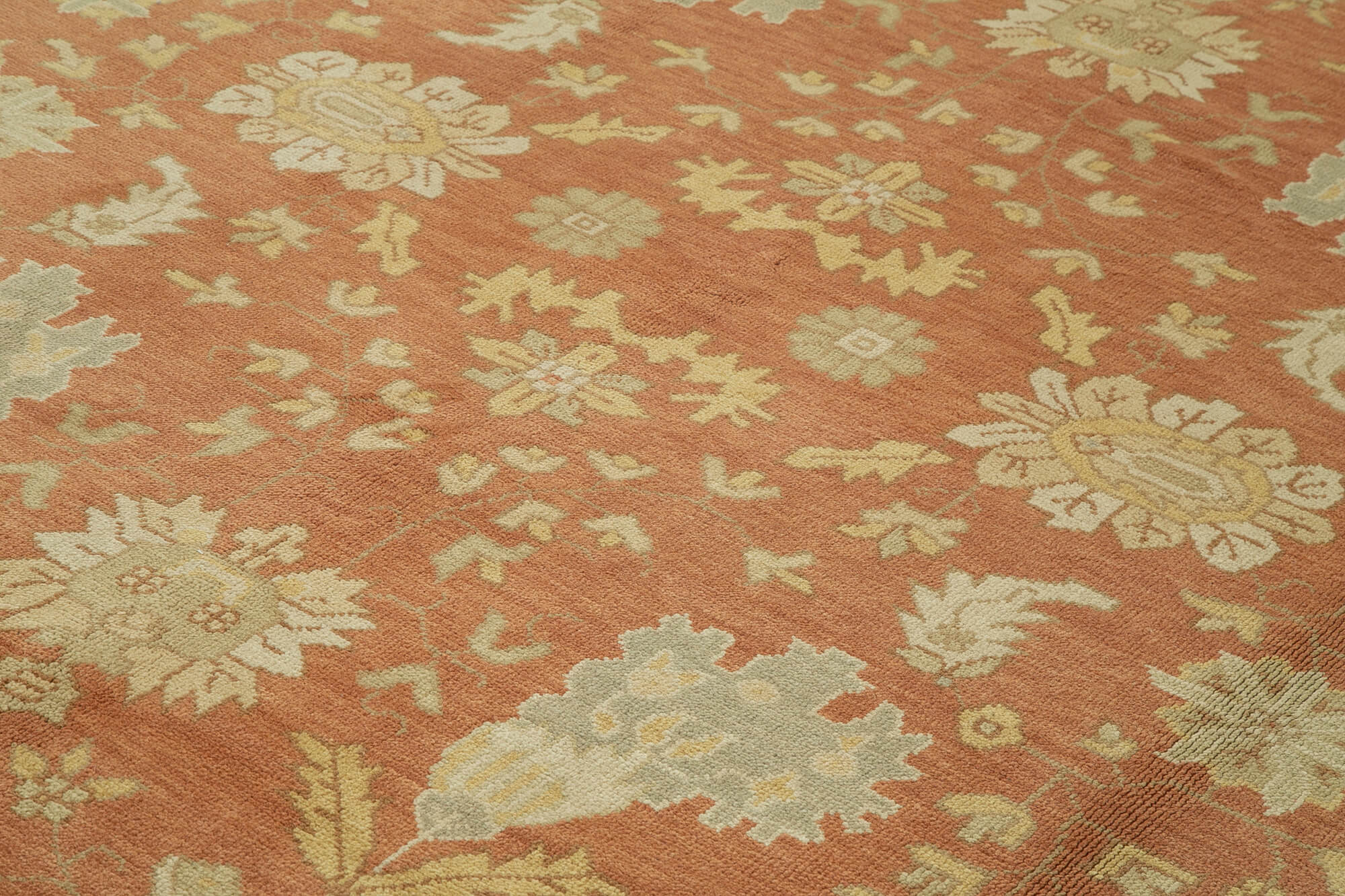 Collection of 9' x 12' Hand-Knotted Oushak Rug in a gallery layout