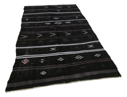 Collection of 4' 10'' x 8' 4'' Turkish Vintage Kilim Rug in a gallery layout