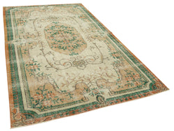 Collection of 5' 5'' x 9' 3'' Hand-Knotted Vintage Turkish Rug in a gallery layout