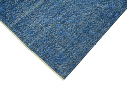 Collection of 6' 8'' x 9' 9'' Handmade Vintage Overdyed Rug in a gallery layout