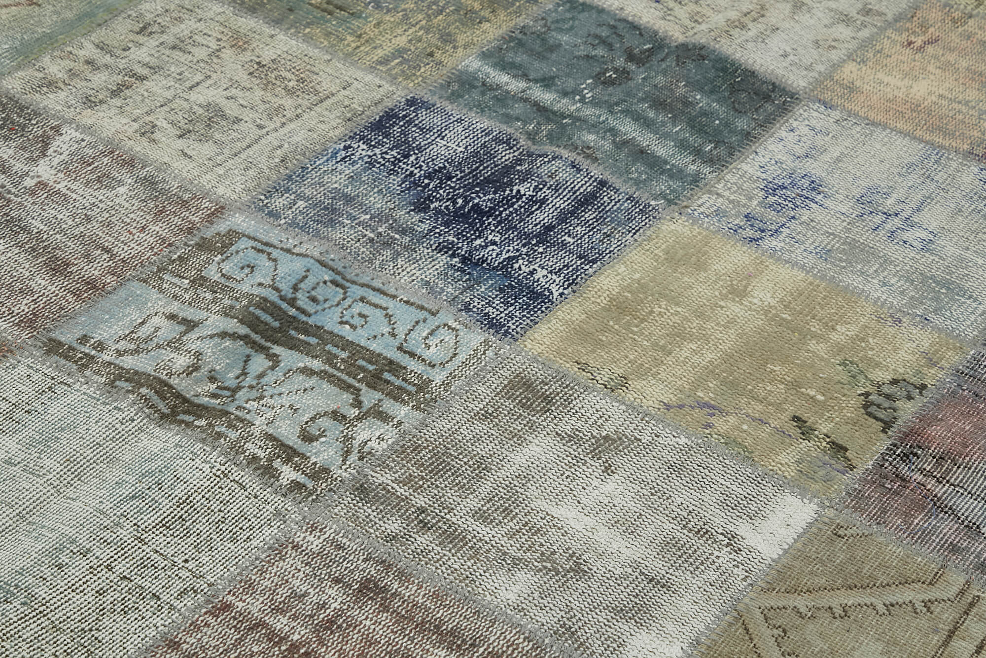 Collection of 8' 2'' x 11' 2'' Hand-Knotted Turkish Patchwork Rug in a gallery layout