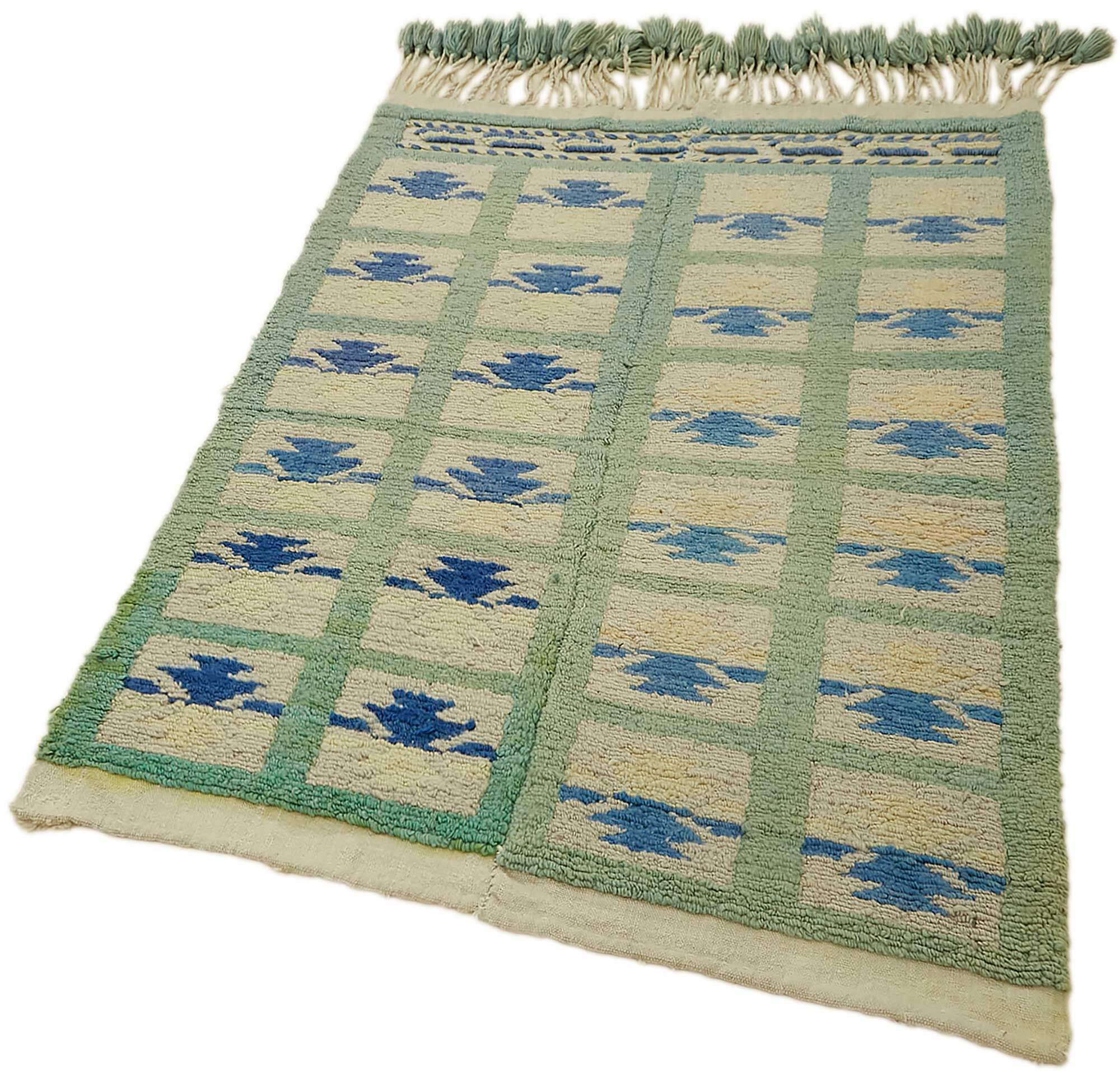 Collection of 3' 5'' x 4' 10'' Vintage Tulu Rug in a gallery layout